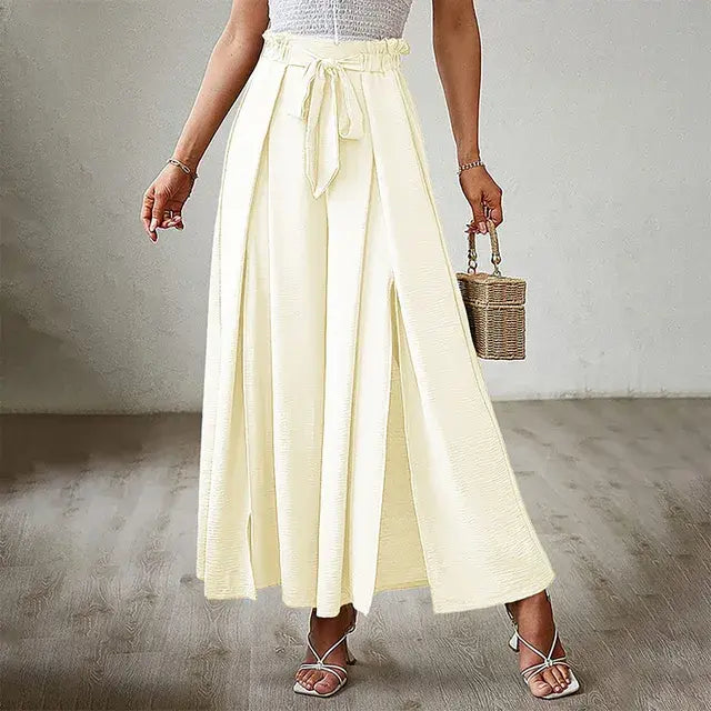 Women's trousers of solid color with elastic band with high waist, wide trousers