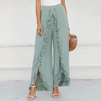Vintage green trousers with a high waist and wide legs with green frills