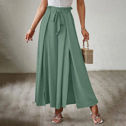 Women's trousers of solid color with elastic band with high waist, wide trousers