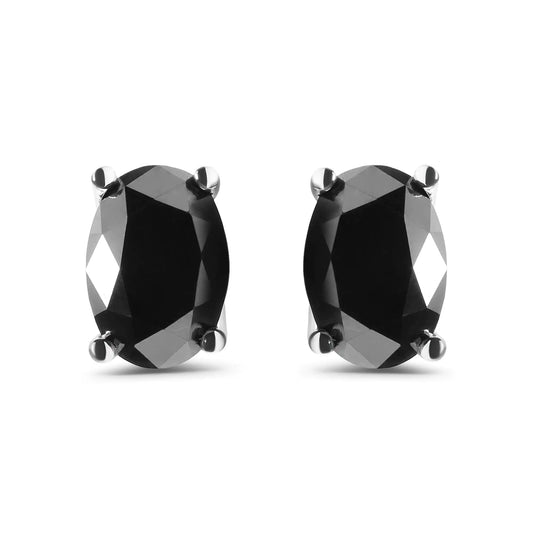 Stud earrings in 14 Carat oval-cut white gold with black Solitaire diamonds weighing 3.00 Carats (black color, transparency I2-I3)
