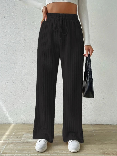 New knitted trousers with ties at the waist and wide legs