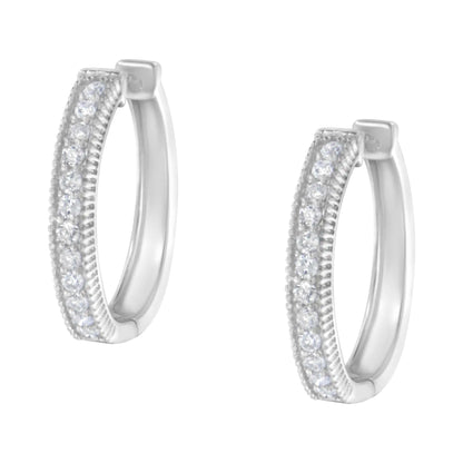 Diamond earrings in 10 carat white gold (weight 1.00 carat, color H-I, transparency I1-I2)