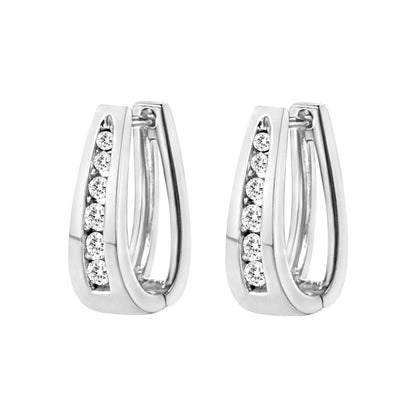 Round-cut diamond earrings in 14 carat white gold (color I-J, transparency I2-I3)