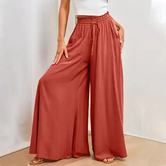 Women's trousers of solid color with elastic band with high waist, wide trousers