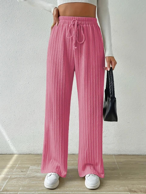 New knitted trousers with ties at the waist and wide legs