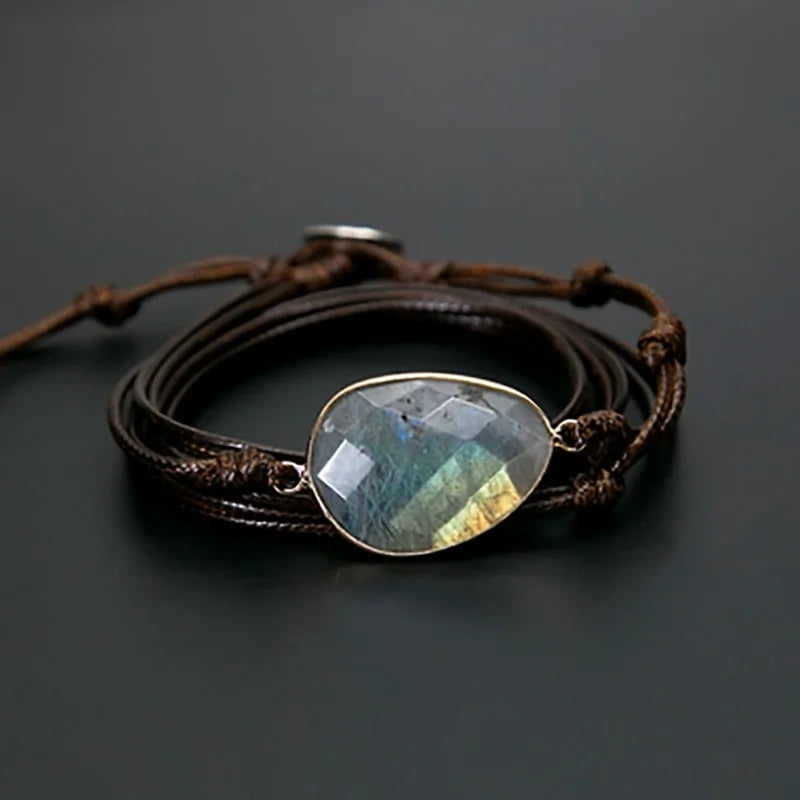 A bracelet made of natural stones on a rope basis