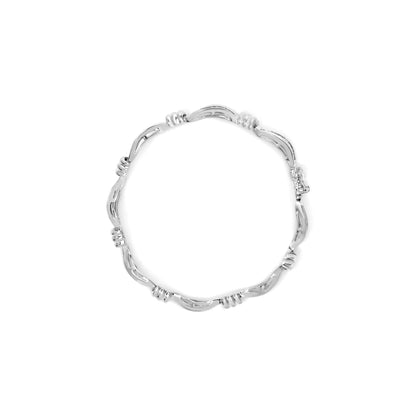 14 Carat white gold bracelet, 2.00 Carats, with a spiral link of baguette cut, 7 inches (color G-H, transparency SI1-SI2)