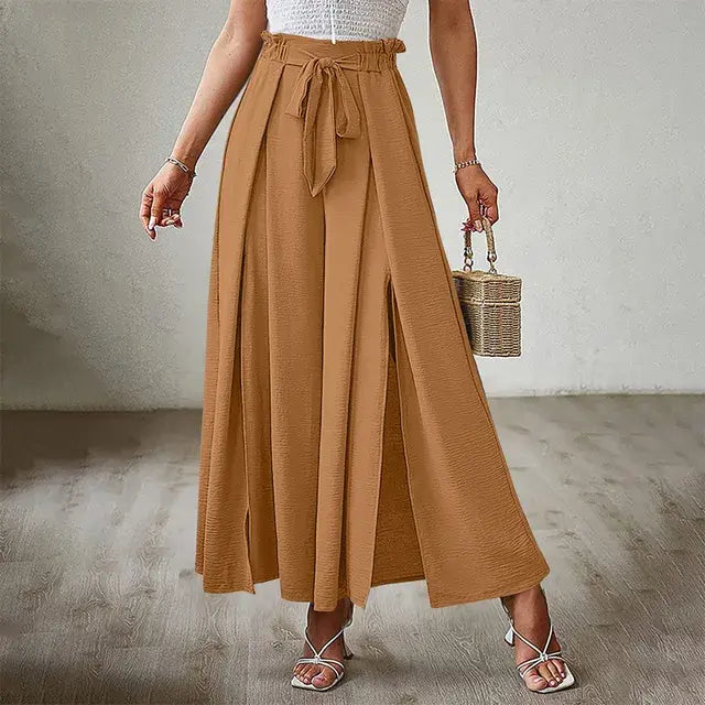 Women's trousers of solid color with elastic band with high waist, wide trousers