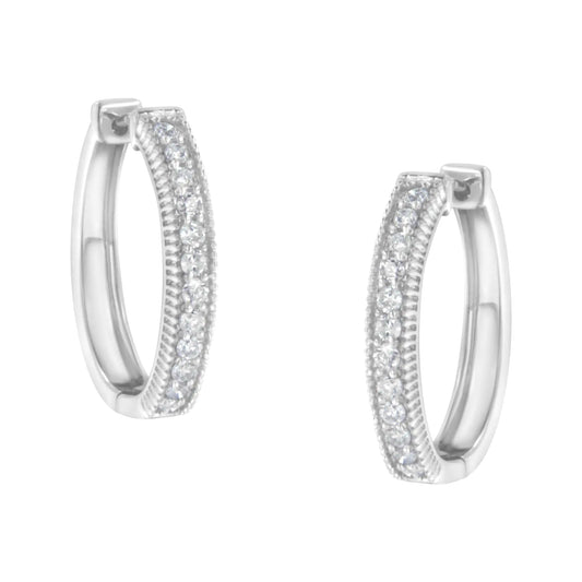 Diamond earrings in 10 carat white gold (weight 1.00 carat, color H-I, transparency I1-I2)
